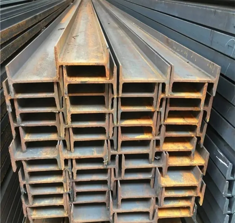 Close-up of stacked I-beams at the Sky Prince Steel yard.